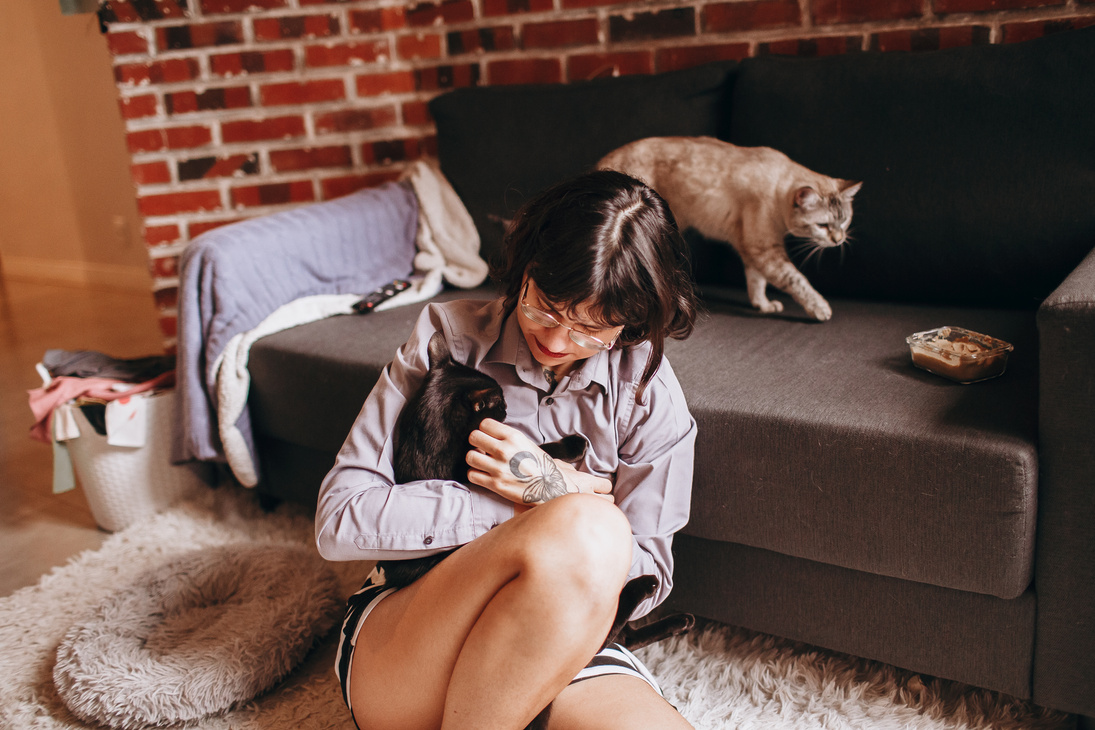 A Woman Holding Her Cat